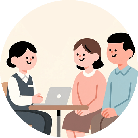 スタッフから説明を受けている夫婦